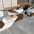 Modern Reception Desk With White Stone Top Wooden Accents And Green Plant Decor