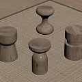Four Wooden Stools with Various Designs in Indoor Setting on Beige Rug