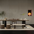 Minimalist Tea Table With Chairs Potted Plants And Decorative Buddha Niche On Rug