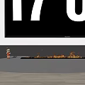 Modern Fireplace With Burning Flames And Small Figurine Below Large Screen Displaying 170 3d model