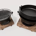 Three Cast Iron Kitchen Appliances With Wooden Base And Mesh Grills For Home Cooking