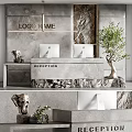 Modern Reception Area with Stone Desk Wall Two Computers Decorative Elephant Sculpture and Green Plant