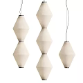Three Diamond Shaped Cream Colored Fabric Pendant Lights Stacked Two Layers With Black Wires