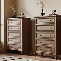 Wooden Dressers With Multiple Drawers And Metal Handles In Room By Window With Decorative Vases