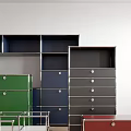 Multicolor Bookcases with Various Designs and Drawers in Interior with Light Floor White Wall