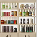 Organized Tea Storage Items on Beige Shelf with Colorful Tea Cans Decorative Plates And Boxes