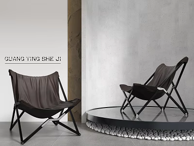 Two Black Leather Lounge Chairs With Metal Frames On Stylish Platform And Pebbles 3d model