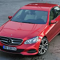 Red Mercedes Benz Sedan With Modern Sleek Exterior And Alloy Wheels