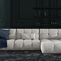 White Sectional Sofa with Blue Throw and Pillows in Dark Wall Living Room with Shelves