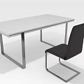 Modern Furniture Set With White Table Top And Black Chair Featuring Metal Frame