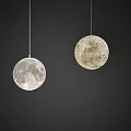 Stylish Moon Shaped Pendant Lights Hanging on Dark Background with Realistic Lunar Surface
