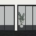Modern Interior With Black Framed Glass Sliding Doors And Green Plant