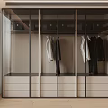 Modern Wardrobe Interior With Glass Doors Hanging Clothes And Drawers