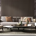 Modern Gray Sofa Coffee Table Combination With Brown Cushions Vase And Decorative Books