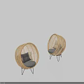 Stylish Rattan Leisure Chairs With Round Design And Gray Cushions On Metal Legs