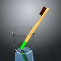 Children's Toothbrush With Yellow Handle Green Bottom Brown Bristles In Glass Cup