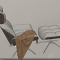 Modern Recliner Chair With White Brown Upholstery Matching Ottoman Brown Blanket Metal Base