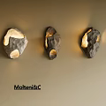 Unique Shaped Wall Lamps by Molteni&C Stone Inspired Design with Warm Glow Illumination