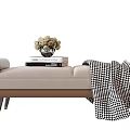 Elegant Beige Brown Living Room Ottoman With Plaid Blanket Stacked Books And Flower Vase
