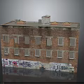 Red Brick Building Exterior With Graffiti Multiple Windows And Yellow Roof Structures