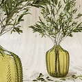 Yellow Textured Glass Vases With Fresh Green Olive Branches On Light Wooden Background