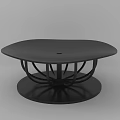 Black Modern Coffee Table With Curved Legs And Round Base Design