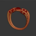 Elegant Gold Ring With Curved Design And Red Gemstone Embellishments For Fashion