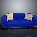 Stylish Blue Sofa With Two Patterned Cushions And Wooden Legs For Living Room