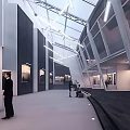 Modern Art Gallery Interior With Hanging Artworks Glass Skylight Visitors And Spacious Design
