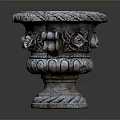 Decorative Stone Planter With Carved Floral Patterns And Intricate Base Details