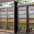 Commercial Display Refrigerators in White Black and Wood Tones Filled with Cold Drinks