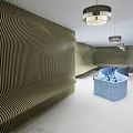 Modern Indoor Space With Wavy Walls Blue Mosaic Pool And Hanging Lights