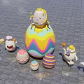 Giant Colorful Easter Egg Photo Spot With Cartoon Characters Blue Sky And Reflective Floor