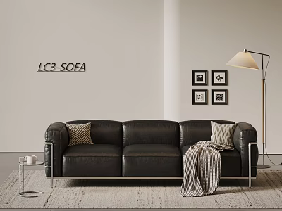 Black Leather Three Seater Sofa With Accent Pillows Striped Throw Blanket Floor Lamp And Wall Art 3d model