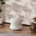 Modern Round White Accent Chair With Textured Surface Light Green Accent Strap And Plant Shadow