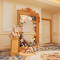 Elegant Photo Spot With Ornate Gold Frame Mirror Fresh Flowers And Decorative Pedestals