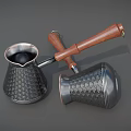 Stylish Metallic Coffee Pot With Wooden Handle And Patterned Surface For Kitchen Use