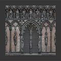 Gothic Building With Reddish Brown Brick Walls Arched Doorway And Carved Stone Figures