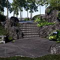 Natural Garden Landscape With Stone Path Steps Rocks And Lush Green Plants