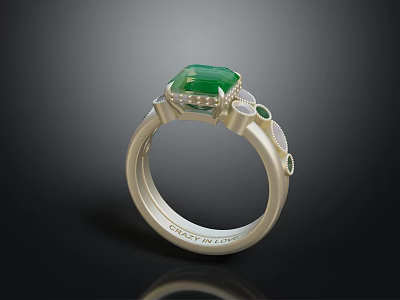 Elegant Silver Ring Featuring Green Gemstone And Small Decorative Accents On Band 3d model