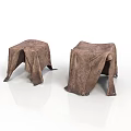 Two Brown Fabric Covered Furniture Stools With Soft Texture And Simple Design