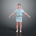 Woman In Light Blue Short Sleeve Top And Skirt With White Shoes On Gray Background