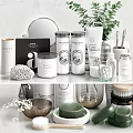 Stylish Bathroom Accessories With Folded Towels Aromatic Bottles And Green Plant On Shelves