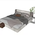 Neutral Double Bed With Simple Headboard Knit Blanket Striped Pillows And Side Table Plant