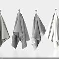 Soft Textured Gray And White Towels Hanging On Hooks Against Clean Minimalist Background