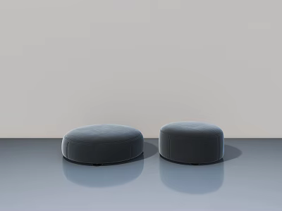 Gray Round Upholstered Ottomans Placed On Smooth Floor With Light Wall Background 3d model
