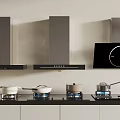Modern Kitchen With Black Range Hoods And Multiple Stovetop Appliances