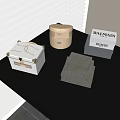 Decorative Storage Boxes With Open Lids And Various Designs On Table Against White Blinds Background 3d model