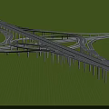 Highway Bridge Interchange With Multiple Curved Lanes And Concrete Piers On Green Grass