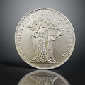 Silver Jewelry Coin Piece Featuring Female Figure And Tree Design On Shiny Metal Surface